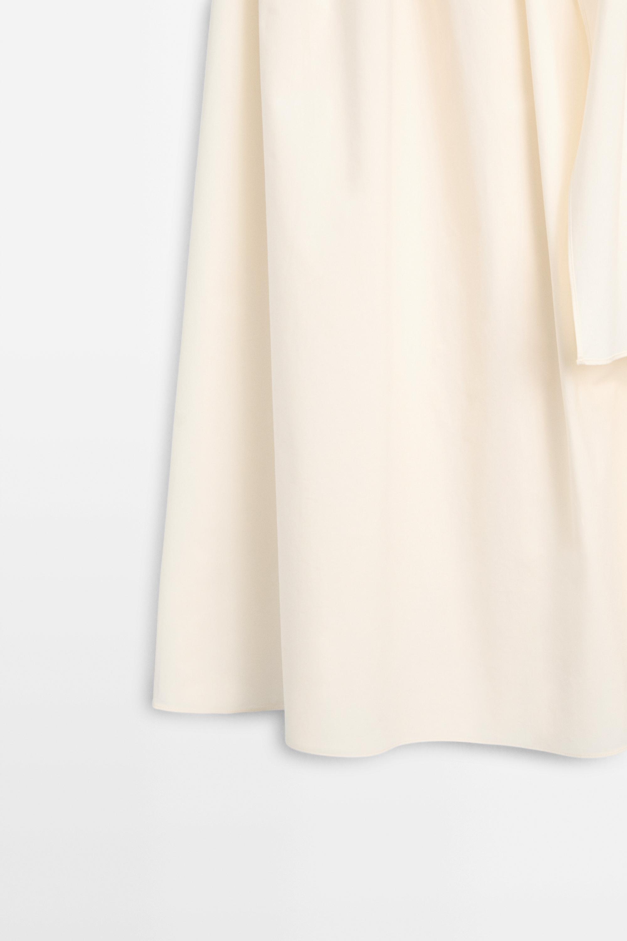 Flowing skirt with scarf detail